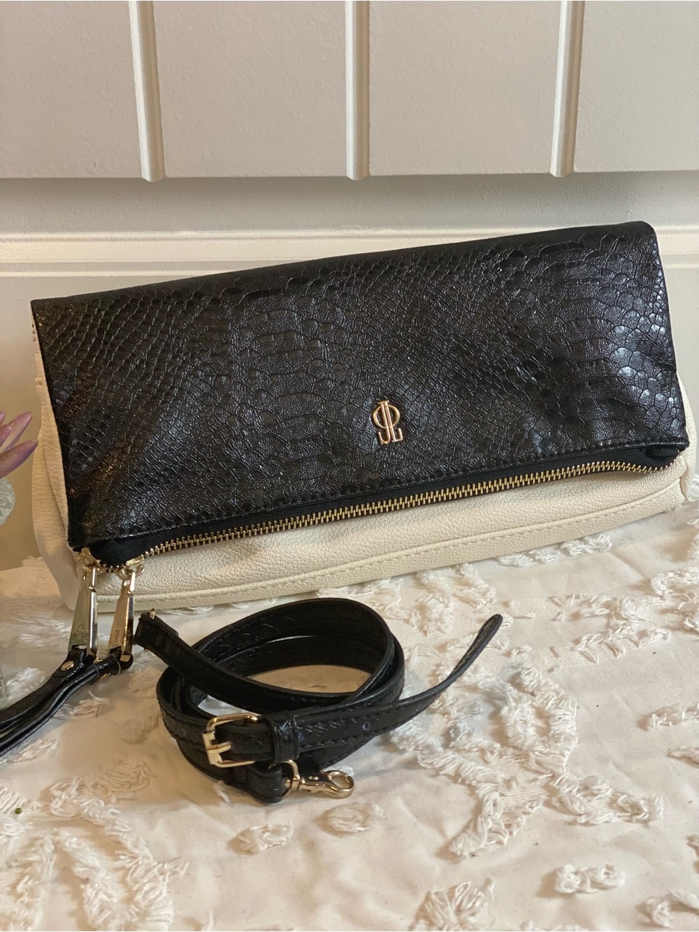 Jennifer Lopez Two-Tone Foldover Clutch in Black & Cream